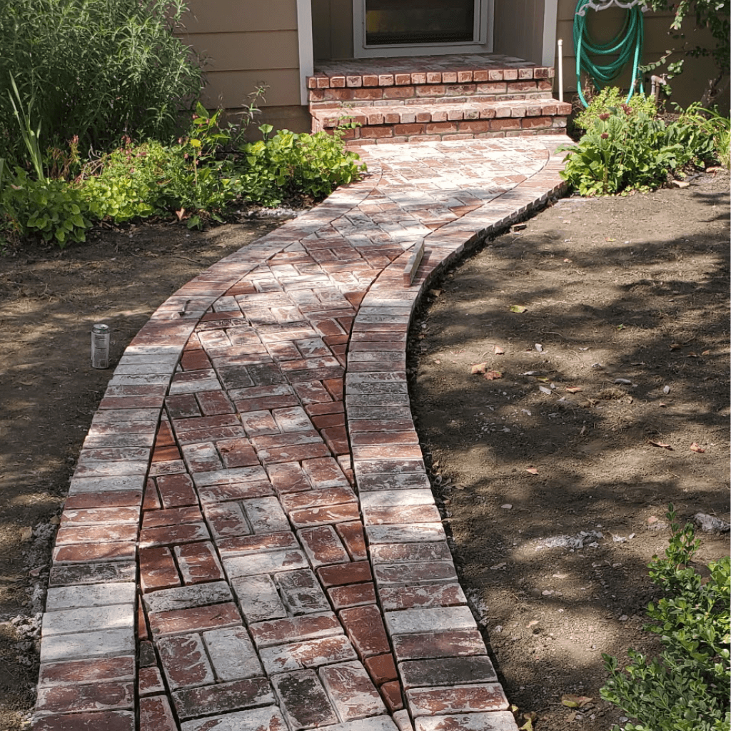 curved rustic brick path way leading to a residence in Santa Rosa CA